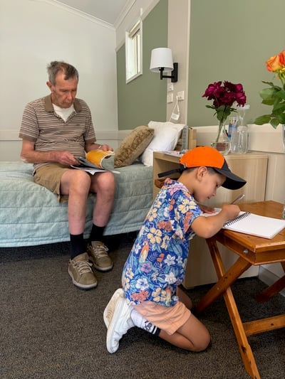 David Osborne with grandson Issac in his room at his Camberwell age care home